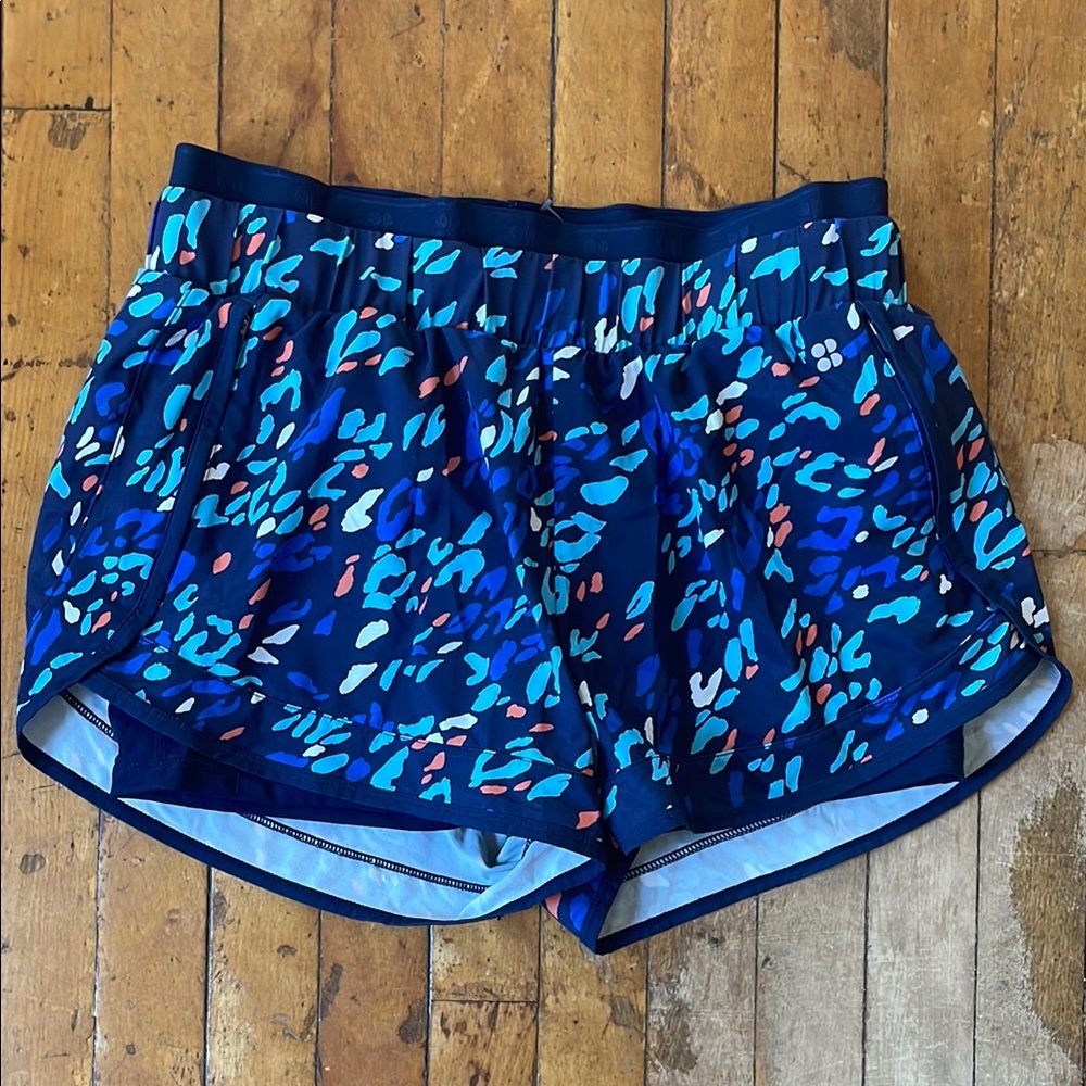 Sweaty Betty Blue and Black Athletic Shorts with Curved Hems
